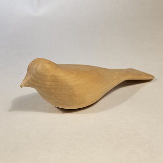 Spikket og pusse fuglefigur